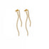 A pair of elegant gold diamond-encrusted drop earrings showcases wavy, dangling strands against a clean white background.