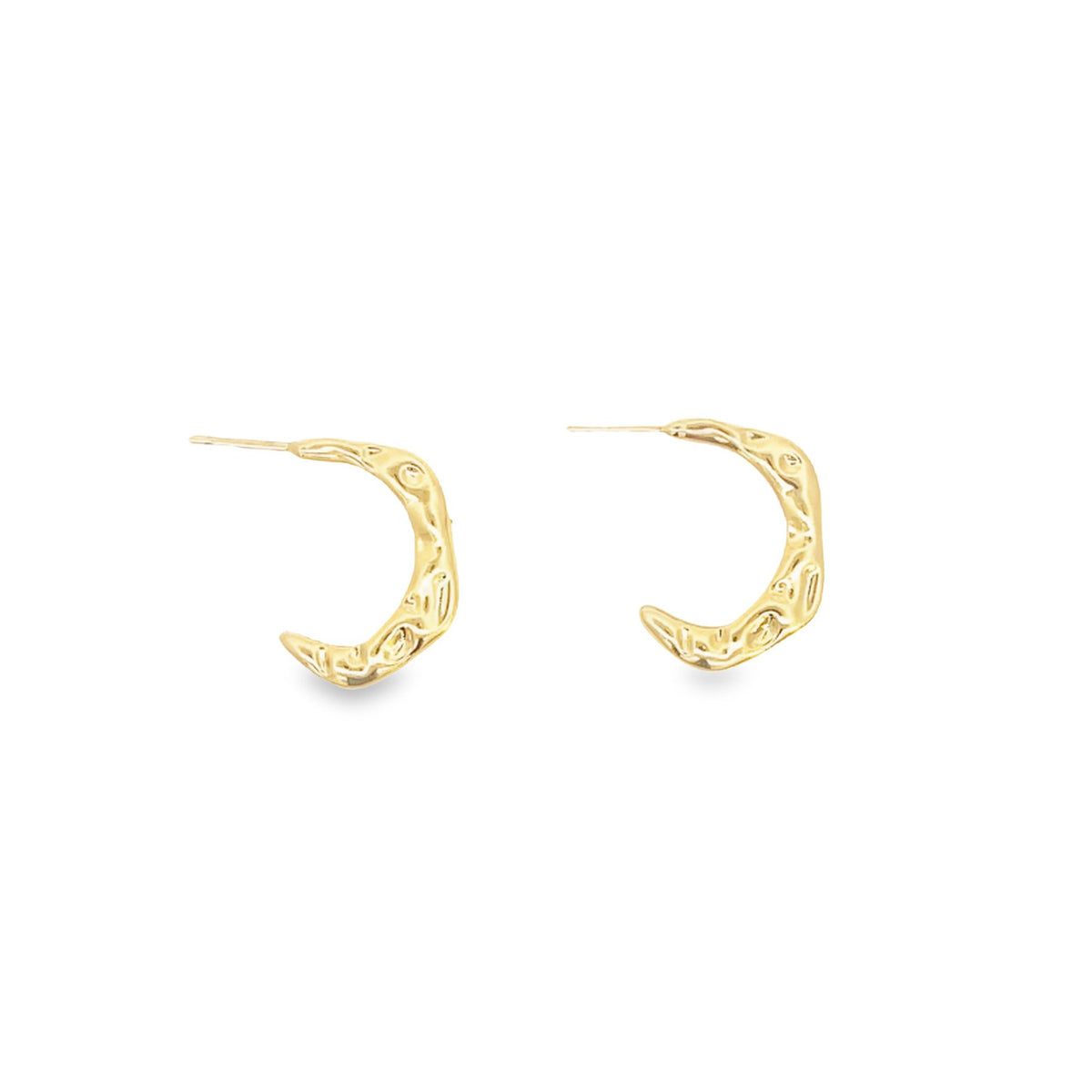 A pair of textured gold hoop earrings rests against a clean white background.