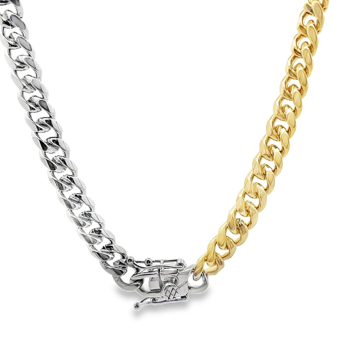 A two-tone cuban link necklace features a silver chain on the left and a gold chain on the right connected by an ornate clasp.