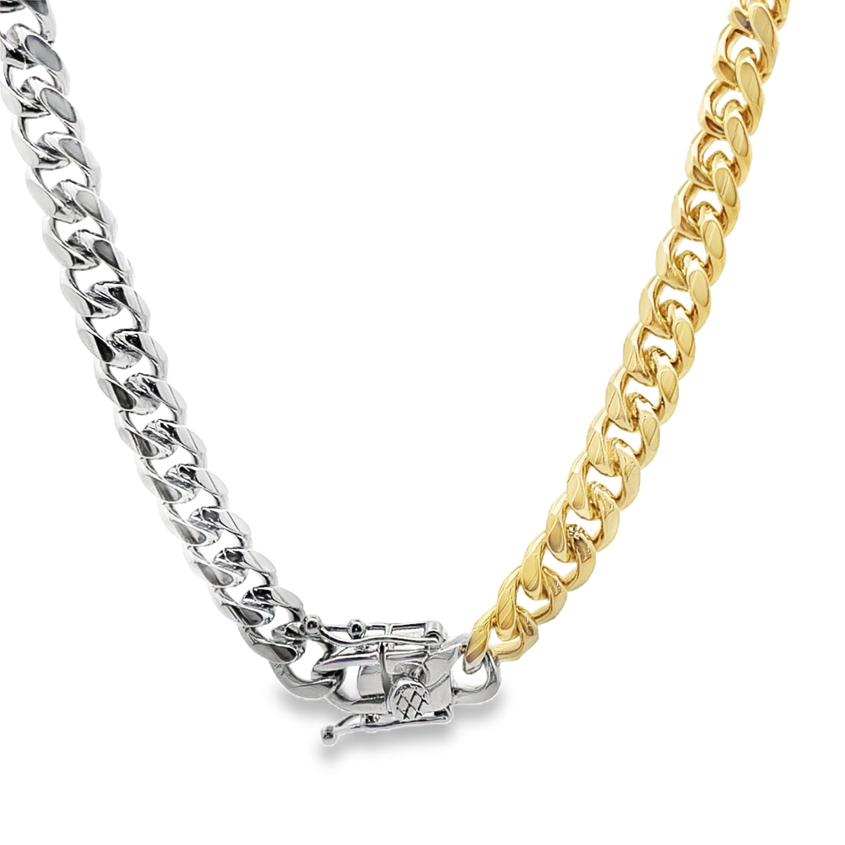 A two-tone cuban link chain combines silver and gold links fastened with a secure clasp.