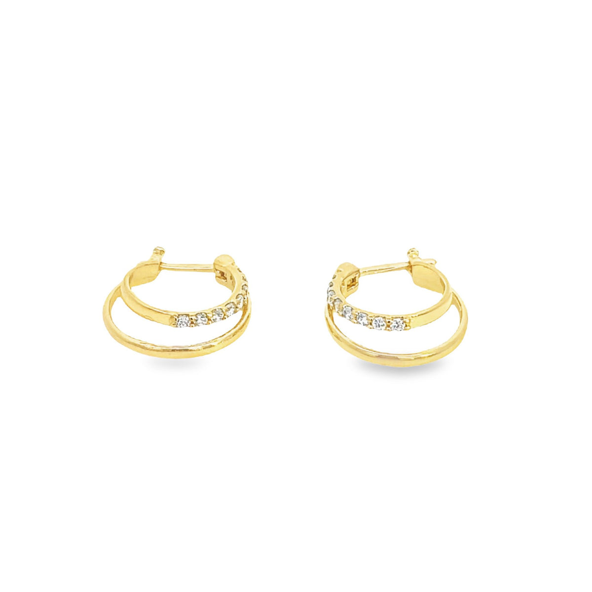 A pair of double-band gold hoop earrings, accented with sparkling diamonds, rests on a plain white background.