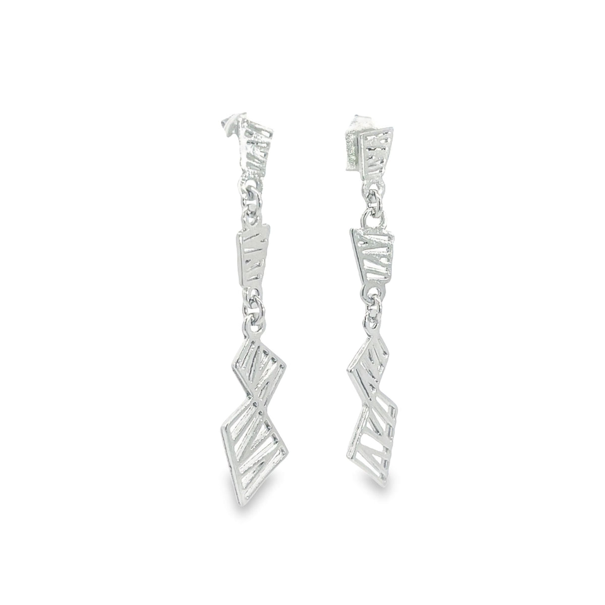 A pair of dangling silver geometric earrings showcases textured, abstract shapes linked by delicate chains against a plain white background.
