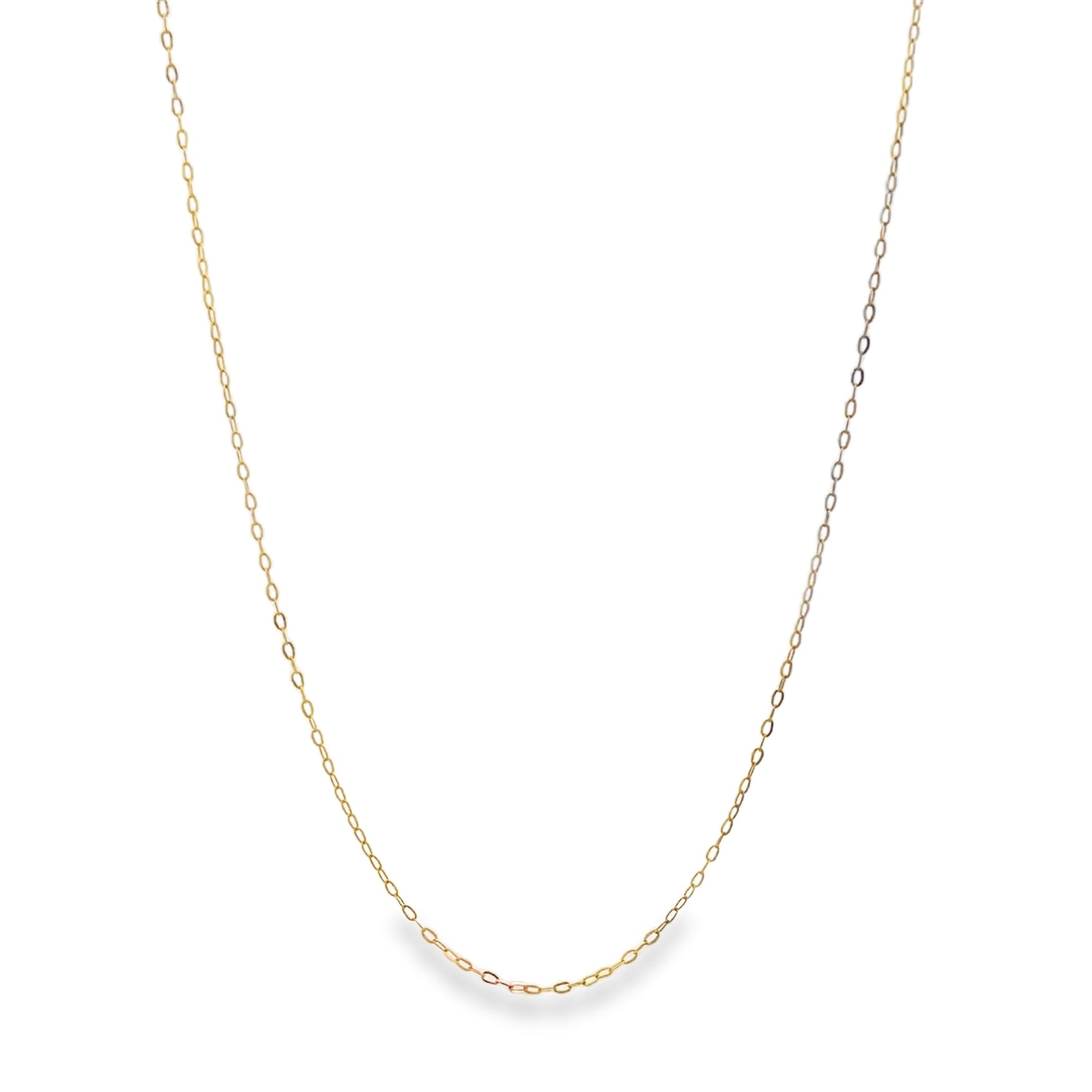 A delicate gold chain necklace drapes against a clean white background.