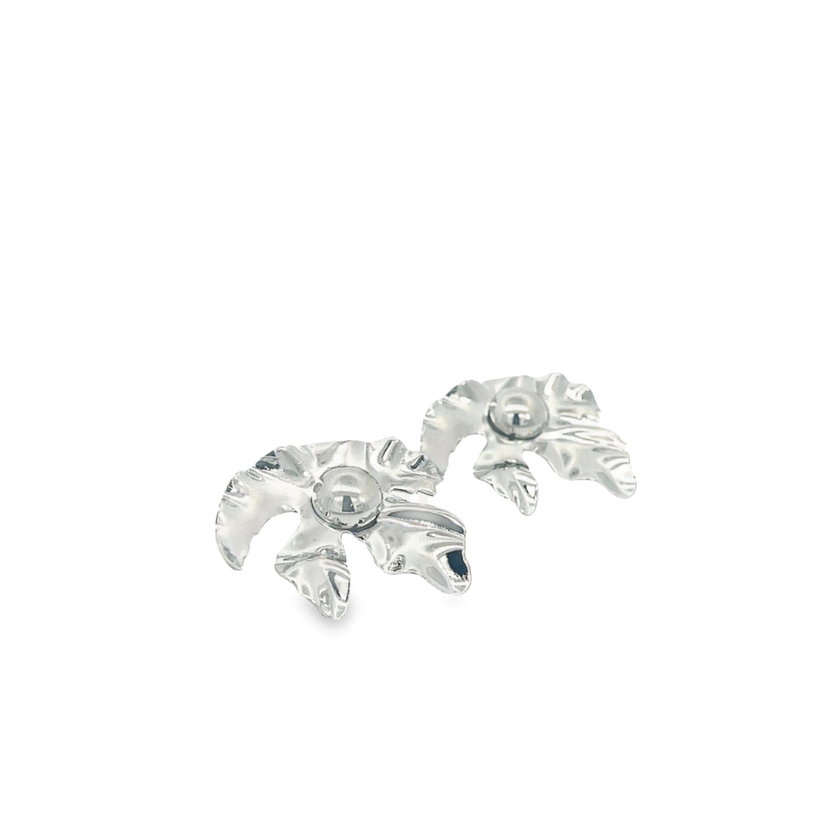 A pair of unique silver earrings shaped like abstract leaves resting on a white background.