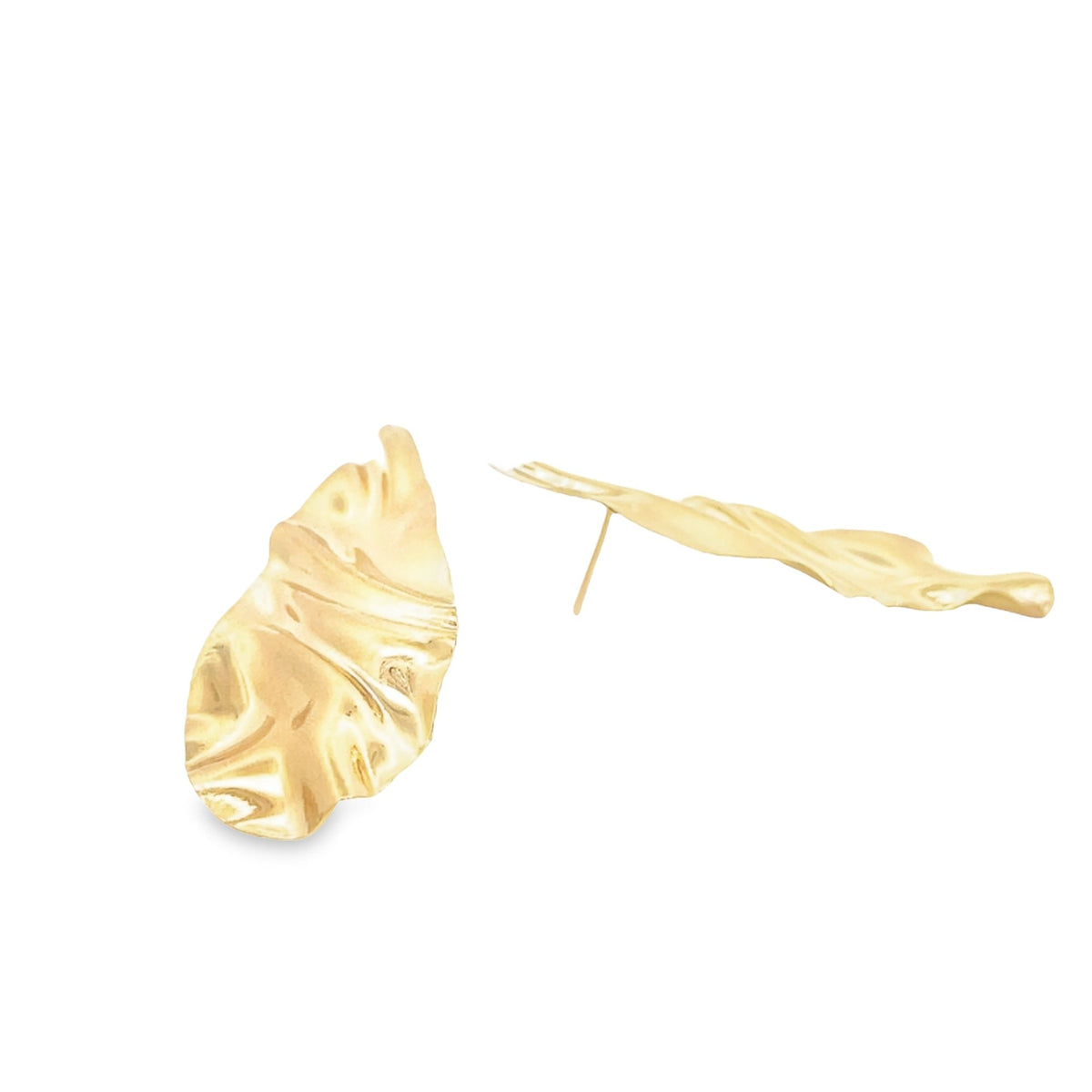 A pair of contemporary gold organic-shaped stud earrings rests against a white background.