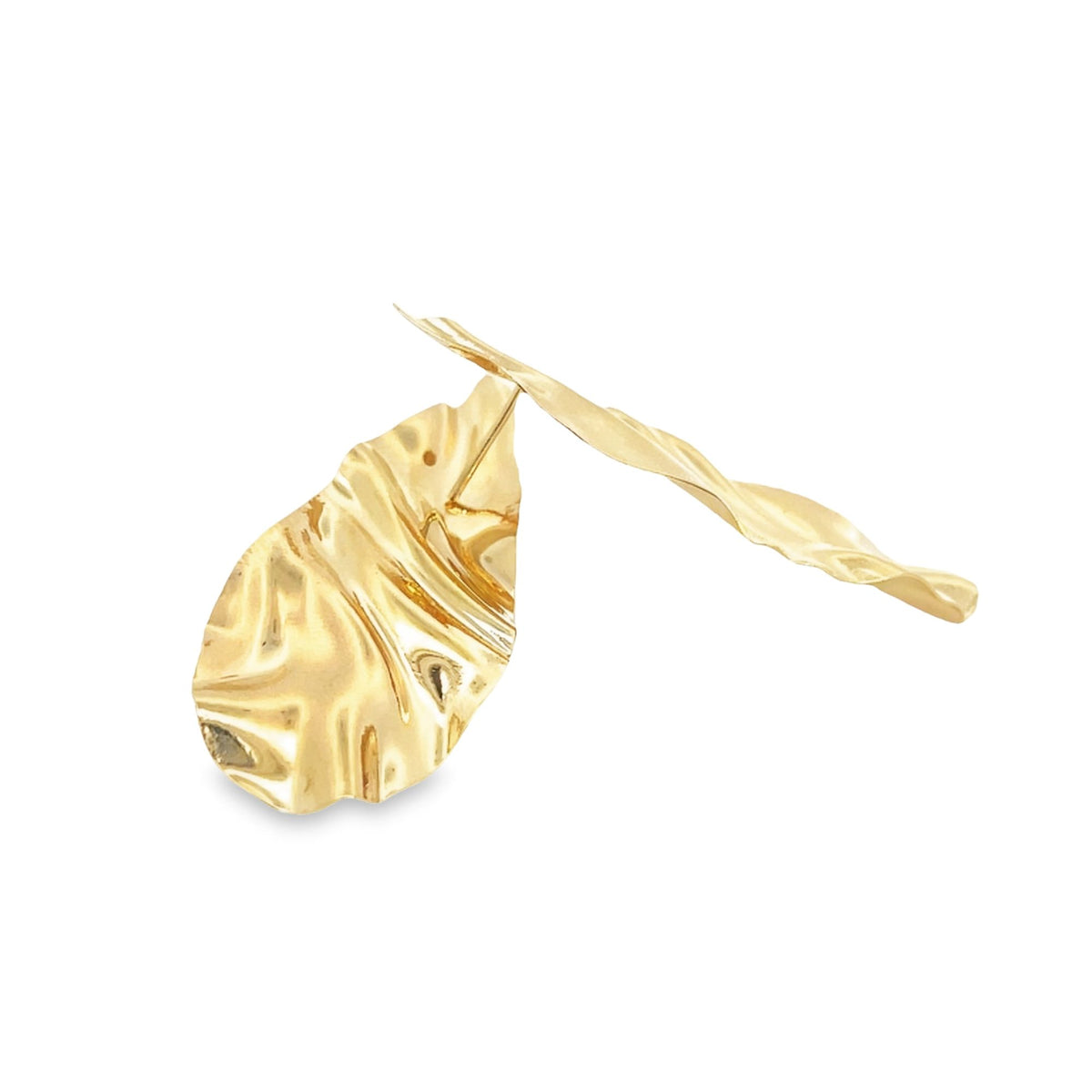 A pair of unique gold leaf-shaped drop earrings rests against a clean white background, showcasing their crinkled, metallic texture.