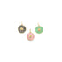 Three gold enamel daisy charms in black, pink, and green lie against a white background.