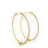 A pair of textured gold hoop earrings featuring a braided design and a smooth ball detail at the bottom against a white background.