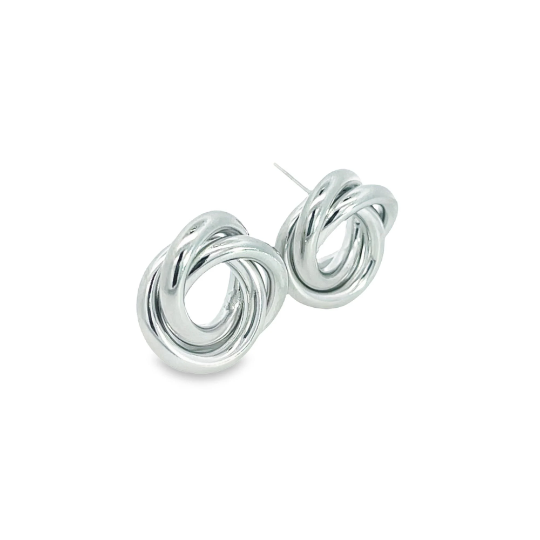 A pair of shiny silver intertwined knot stud earrings sits against a clean white background.