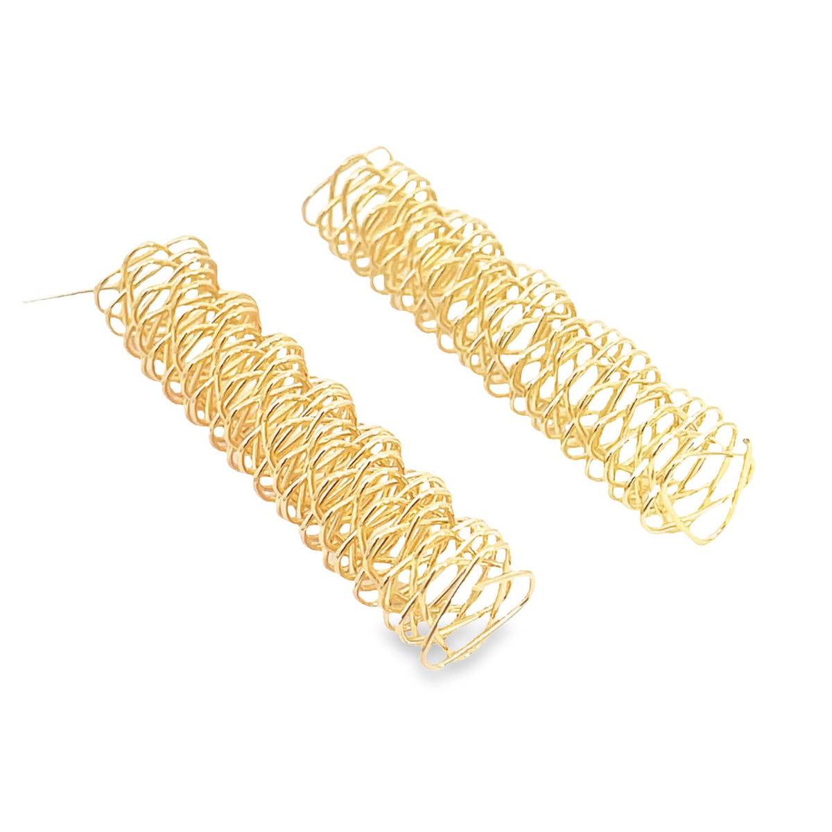 Two long, dangling gold spring earrings rest against a clean white background.
