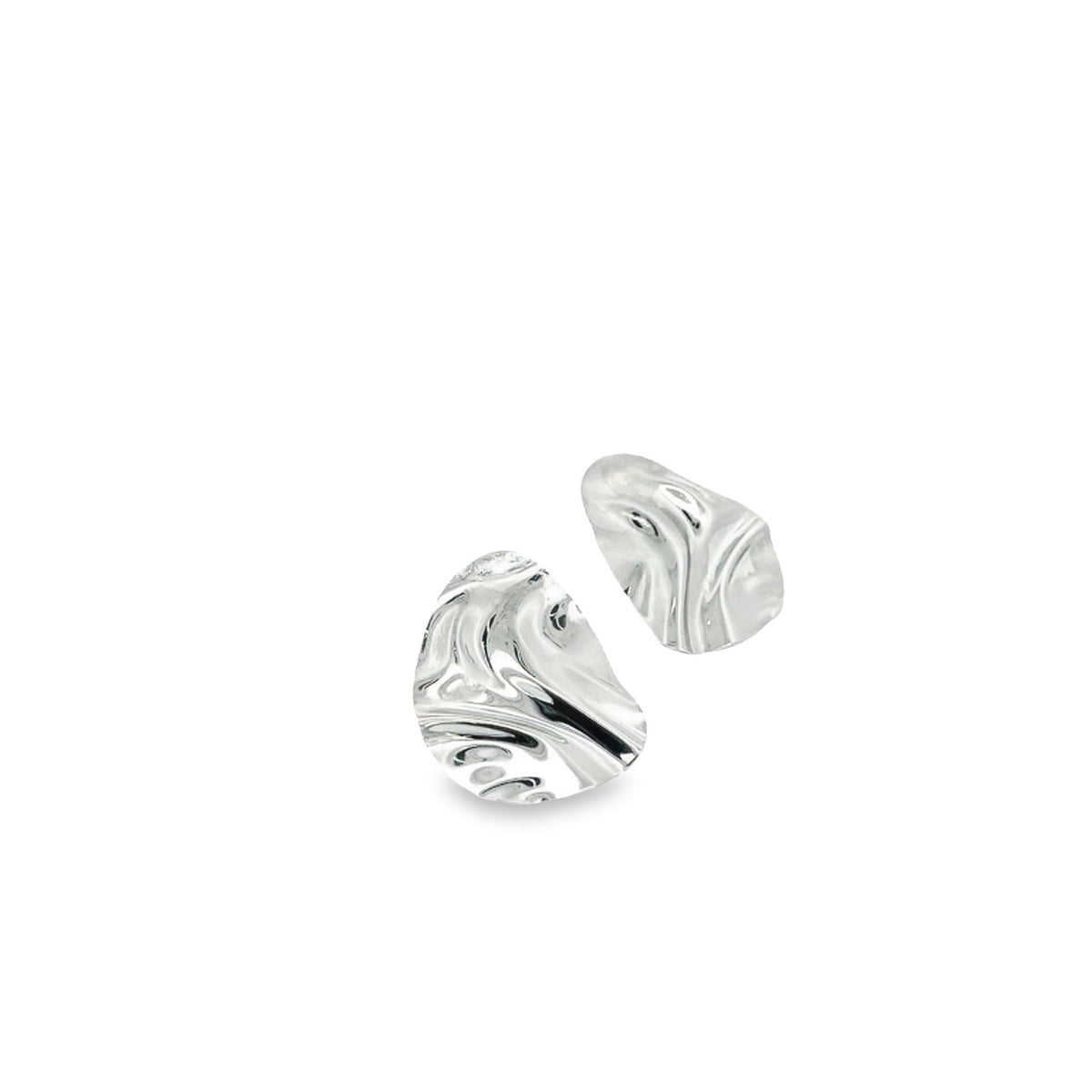 A pair of asymmetrical silver earrings with an abstract, melted-metal texture rests against a white background.