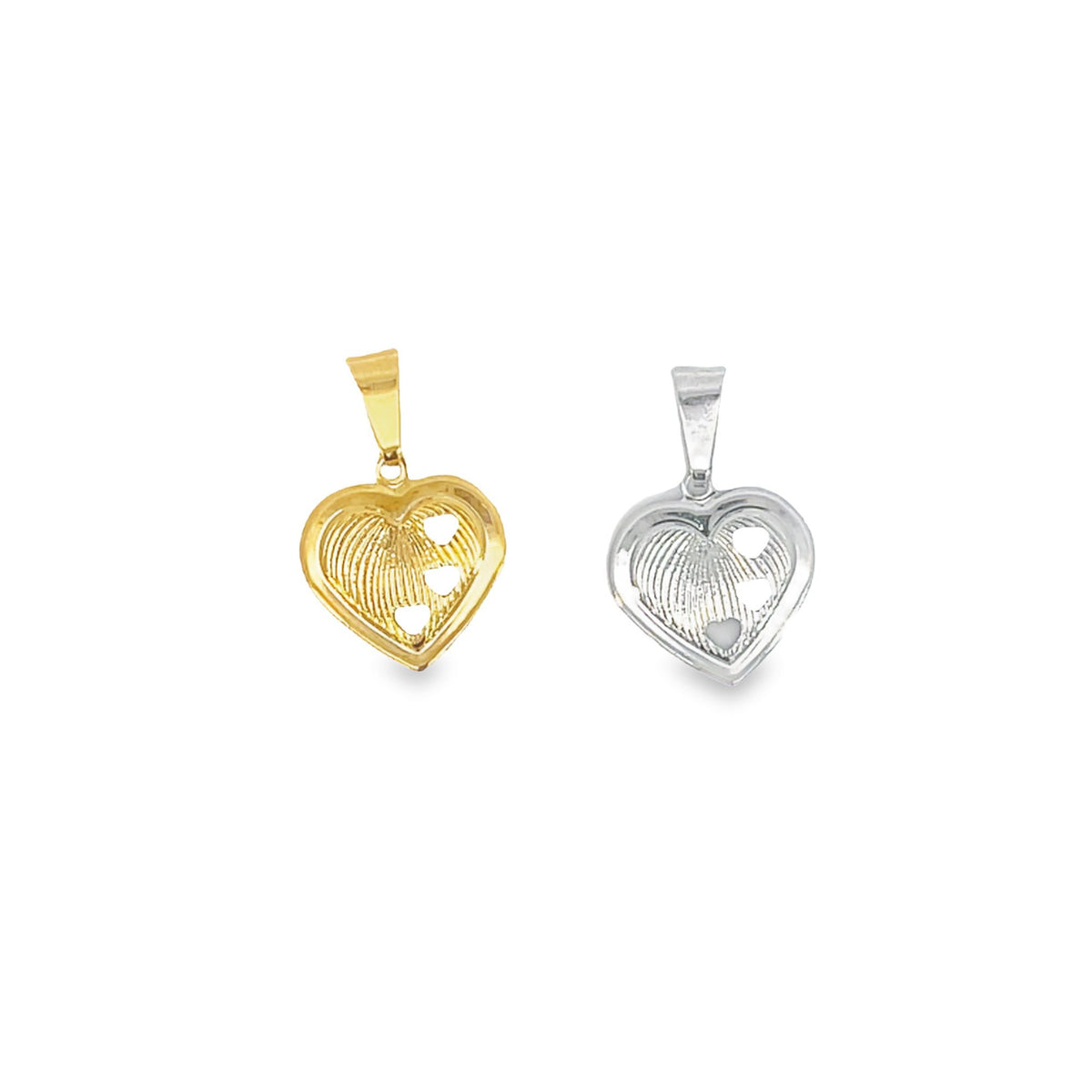 Two heart-shaped fingerprint pendants, one in gold and one in silver, rest side by side against a clean white background.