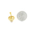 A gold heart-shaped pendant rests next to a US quarter coin to show scale.