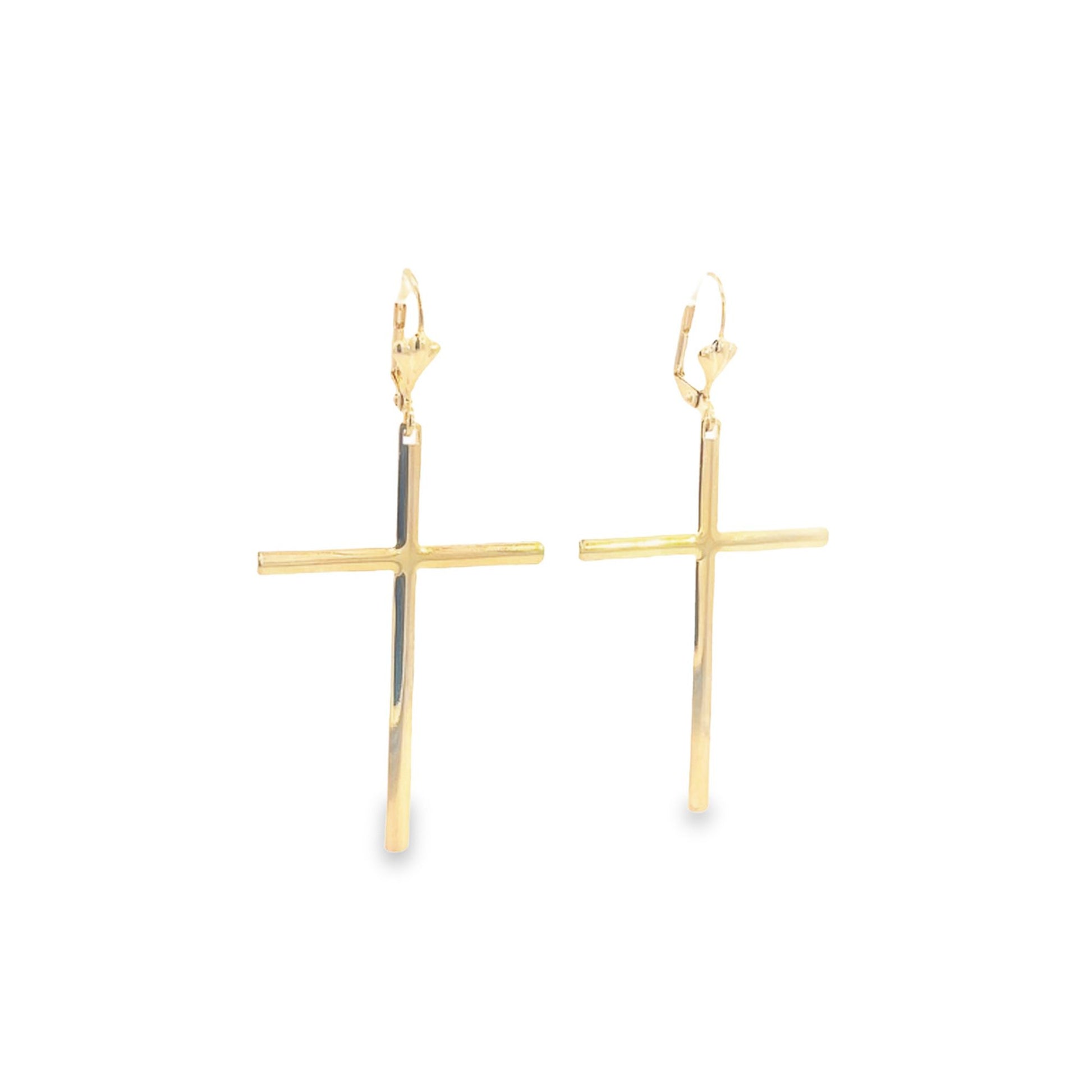 A pair of shiny gold cross dangle earrings hangs against a clean white background.