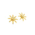 A pair of polished gold daisy flower stud earrings gleams against a clean white background.