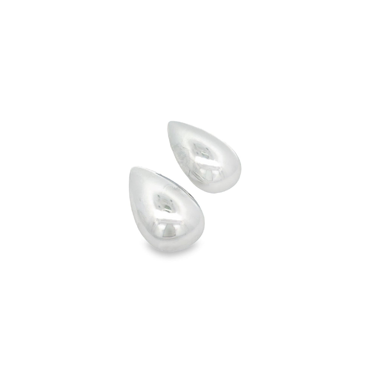 Two polished silver teardrop earrings rest against a clean white background.