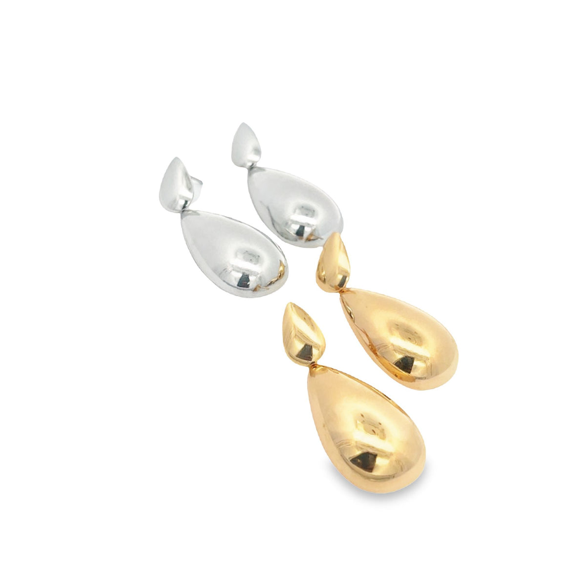 Two pairs of polished teardrop earrings in silver and gold rest side by side against a clean white background.