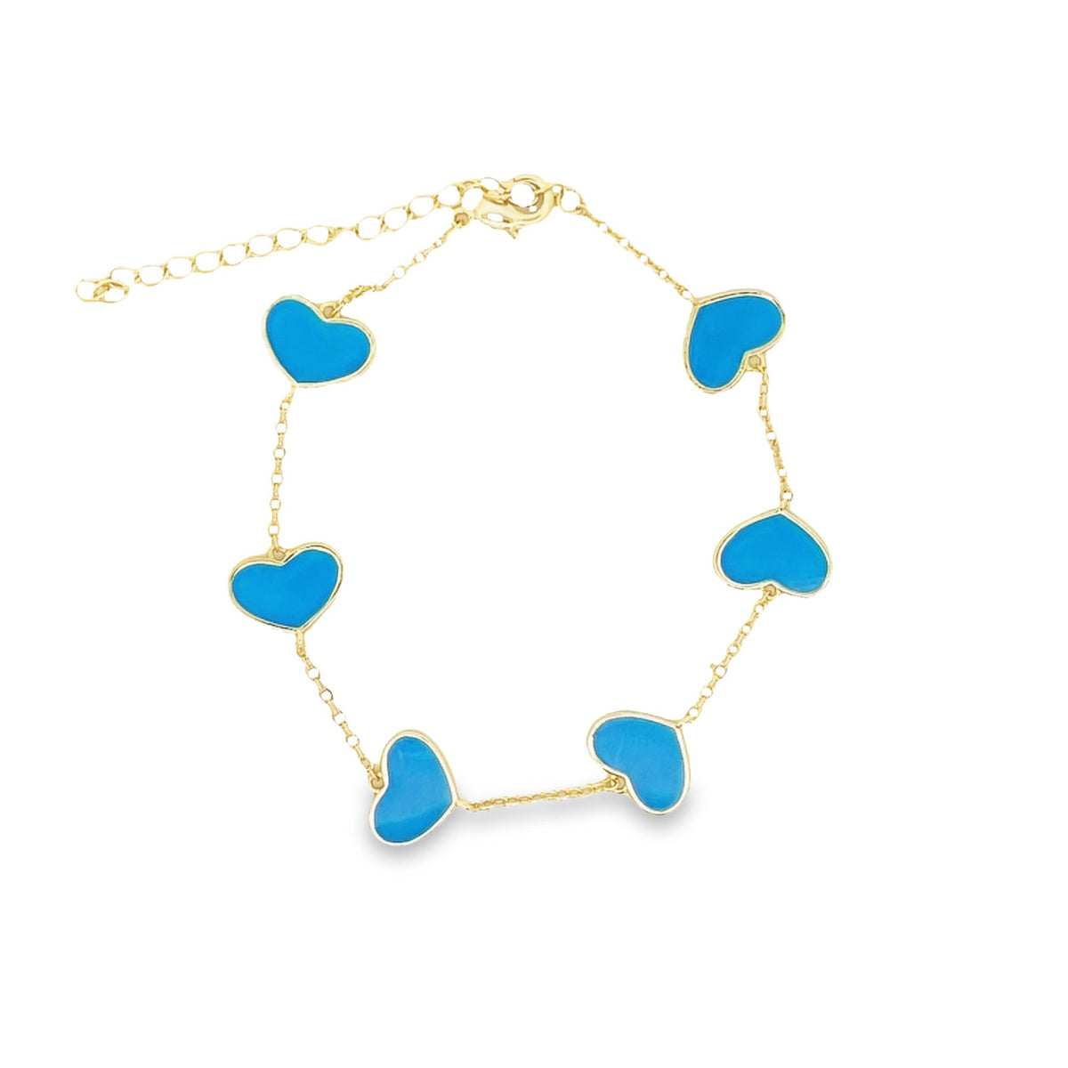 A delicate gold chain bracelet features vibrant blue enameled heart charms arranged evenly around the wrist.