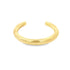 A minimalist gold cuff ring rests on a clean white background.