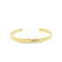 A polished gold cuff bracelet displays a twisted rope design against a clean white background.