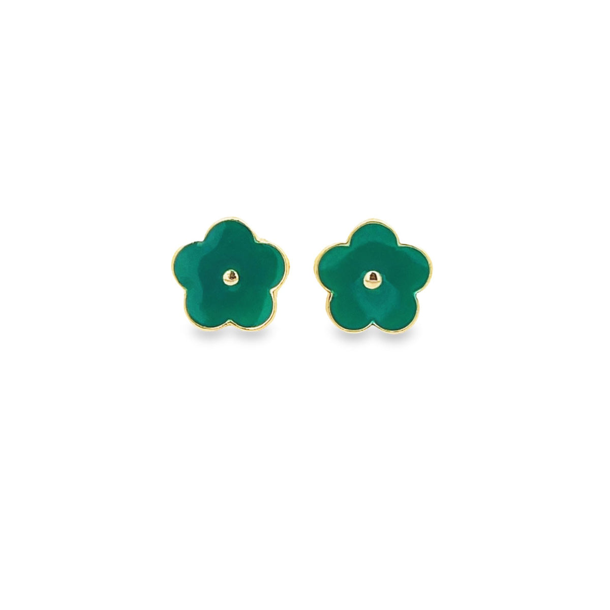 A pair of gold-trimmed green flower stud earrings rests against a white background.