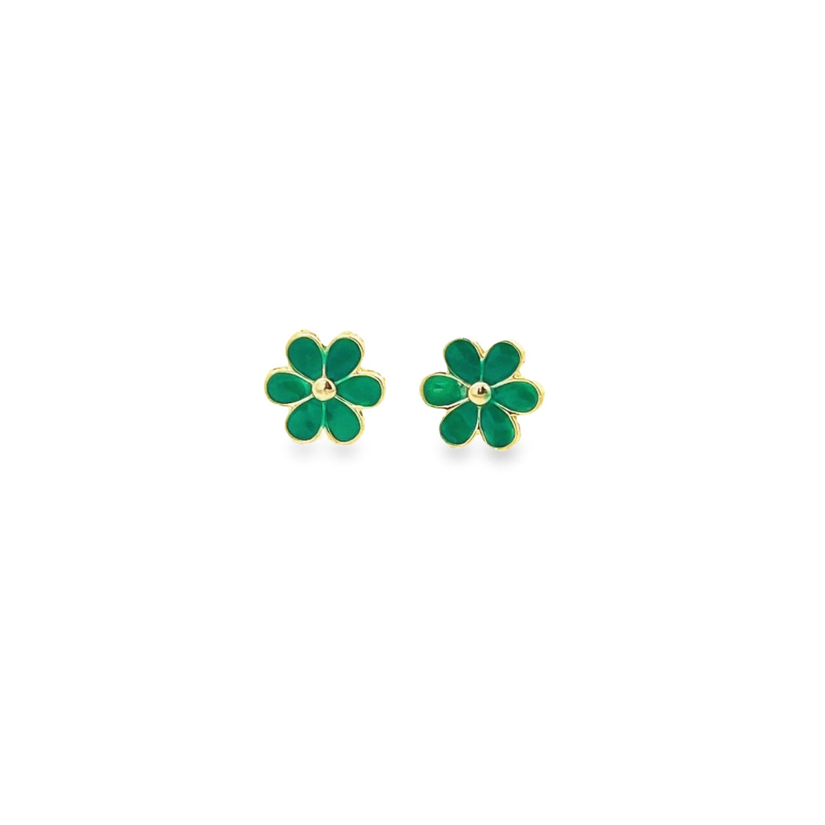 A pair of gold enamel green flower stud earrings rests against a white background.