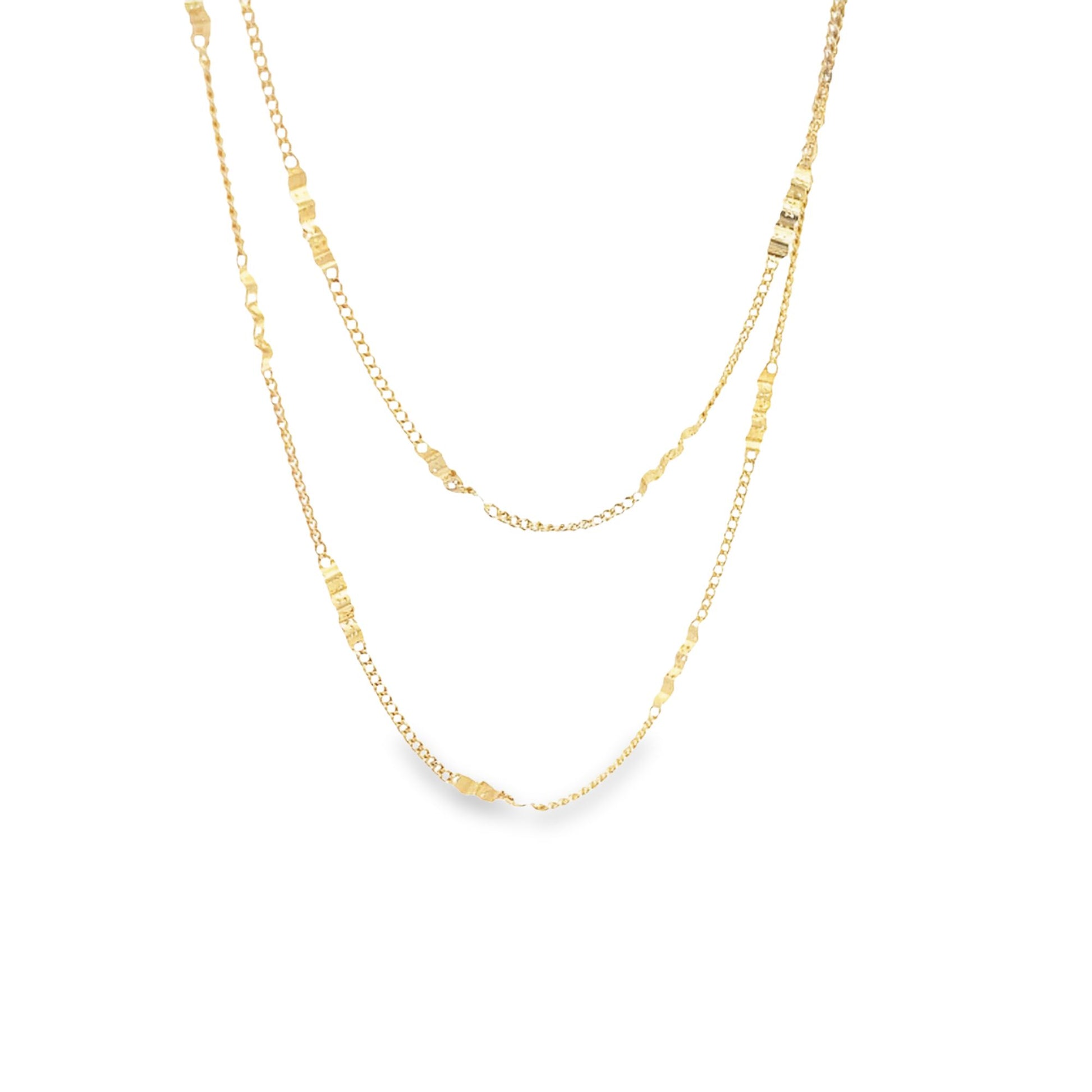 Two delicate gold chain necklaces with textured geometric links drape gracefully against a white background.