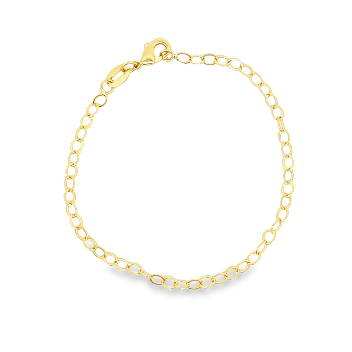 A delicate yellow gold chain bracelet with an oval link design rests against a clean white background.