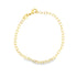 A delicate yellow gold chain bracelet with an oval link design rests against a clean white background.