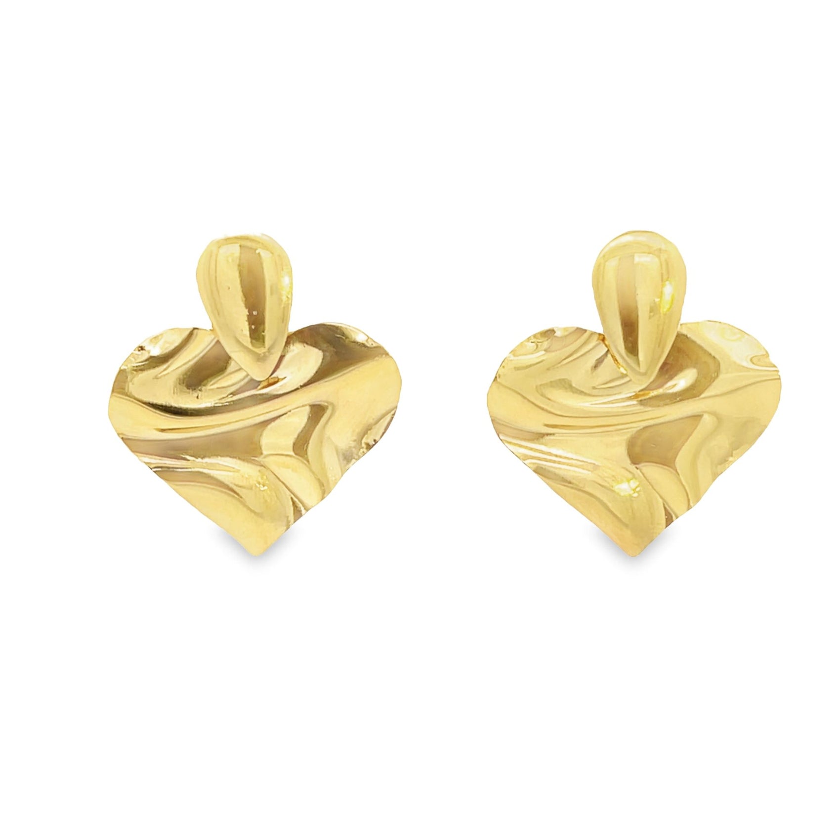 A pair of textured gold heart-shaped earrings gleams against a clean white background.