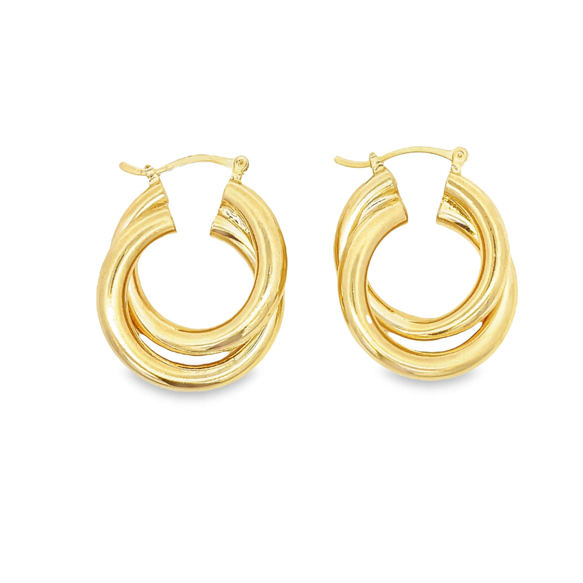 A pair of polished gold double-hoop earrings rests against a clean white background.
