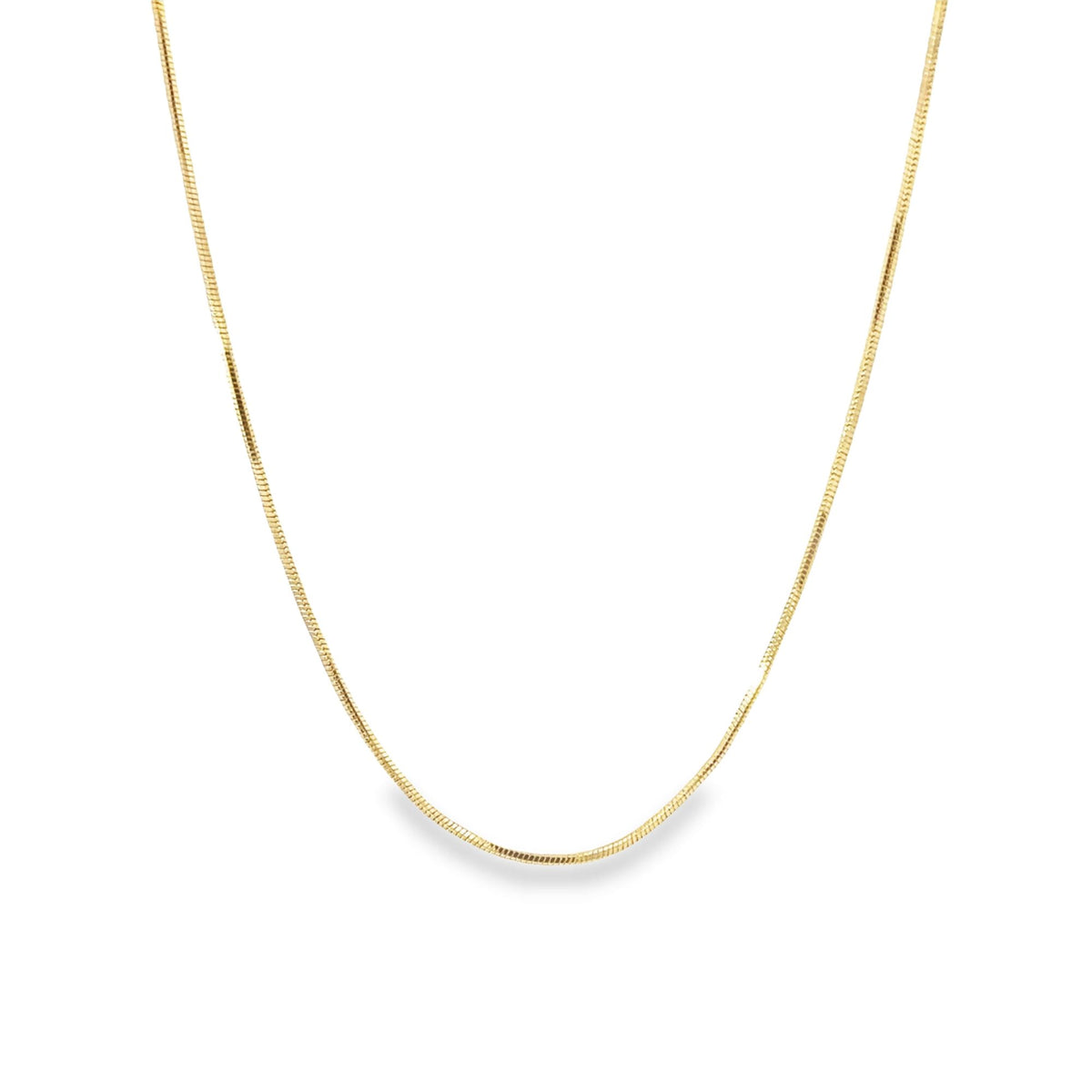 A delicate gold snake chain necklace drapes gracefully against a clean white background.