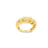 A shiny gold croissant dome ring rests against a plain white background.