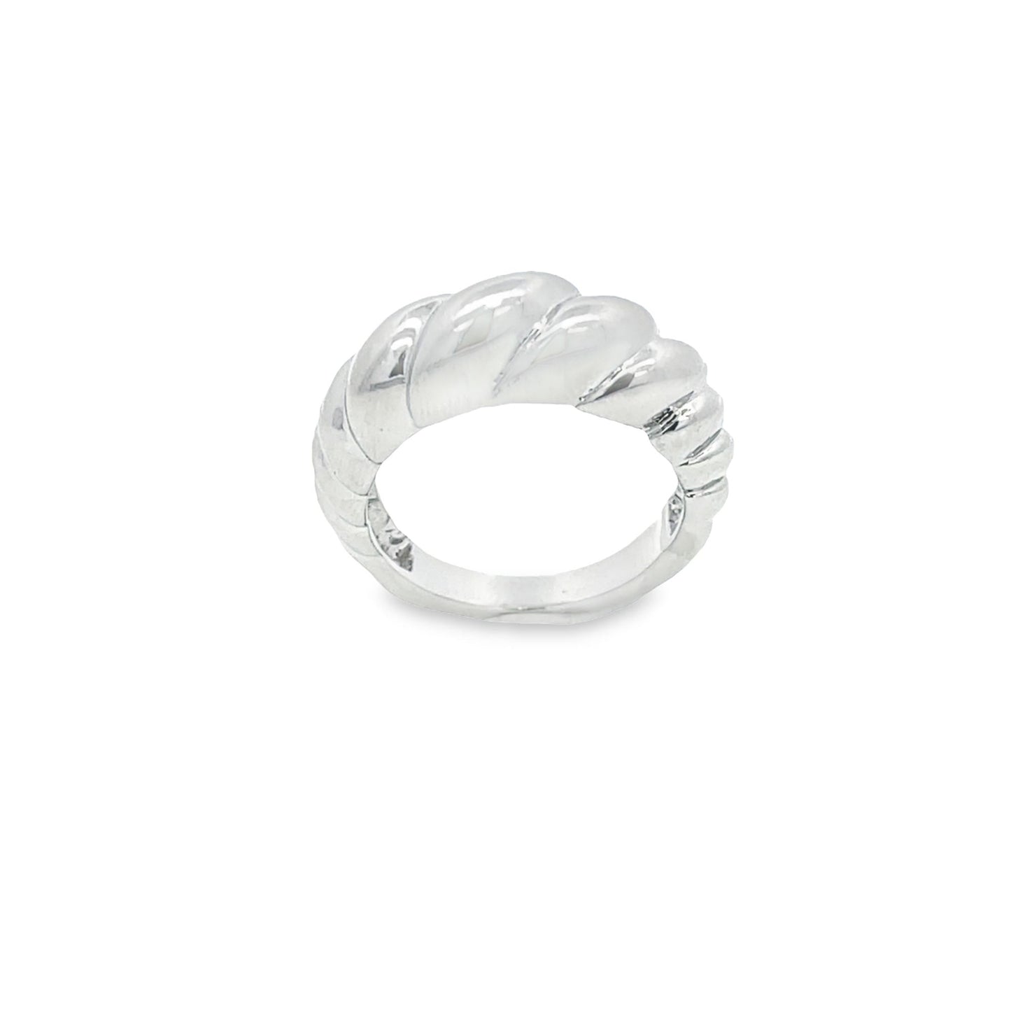 A polished silver croissant dome ring sits against a plain white background.