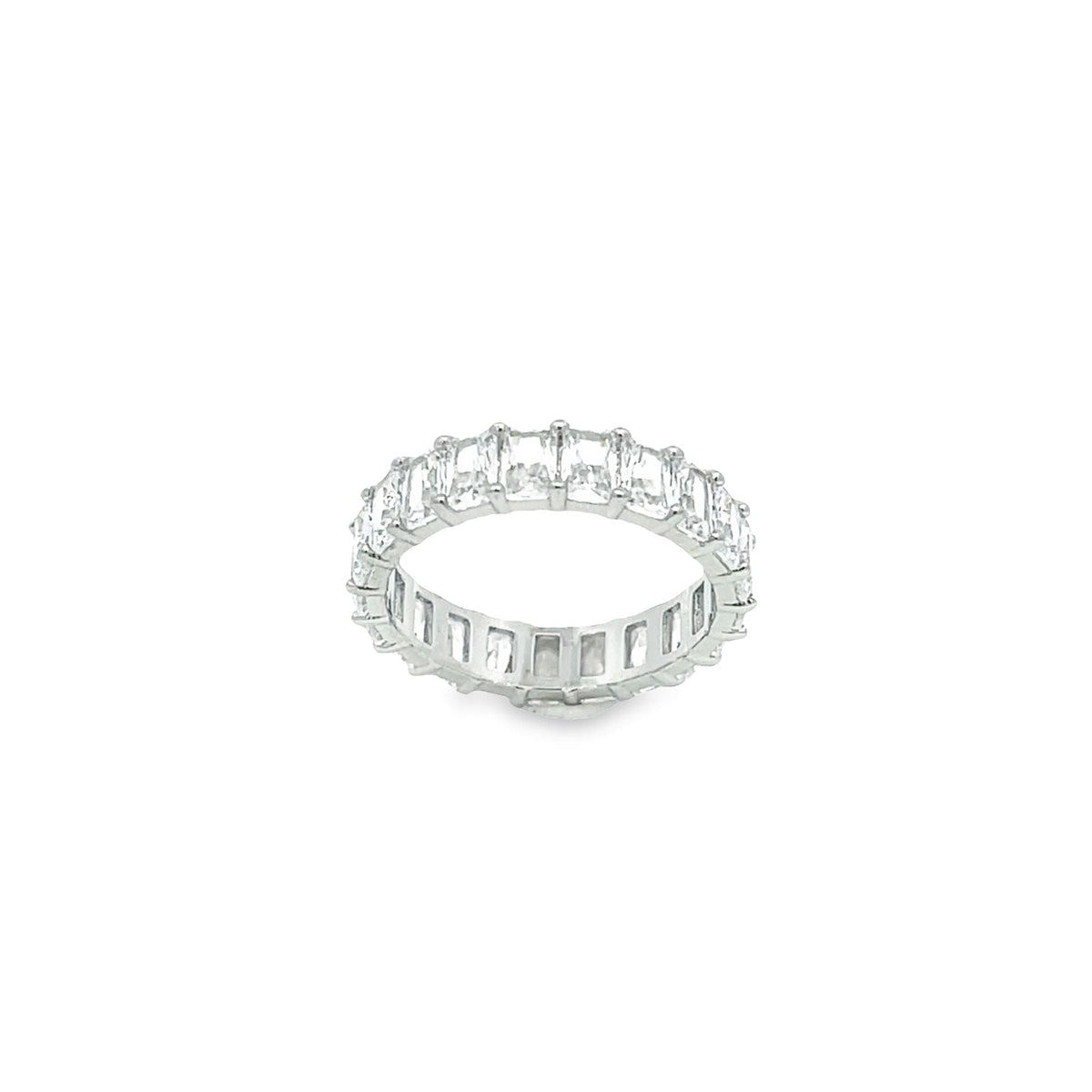 A sparkling silver eternity band features a continuous circle of rectangular baguette-cut diamonds against a plain white background.