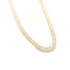 A gold tennis necklace features a continuous strand of sparkling baguette-cut diamonds against a white background.