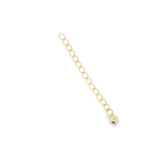 A gold necklace extender chain features a delicate heart charm dangling at the end against a plain white background.