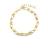 A gold link bracelet featuring interlocking elongated paperclip links and small decorative spheres is displayed against a white background.