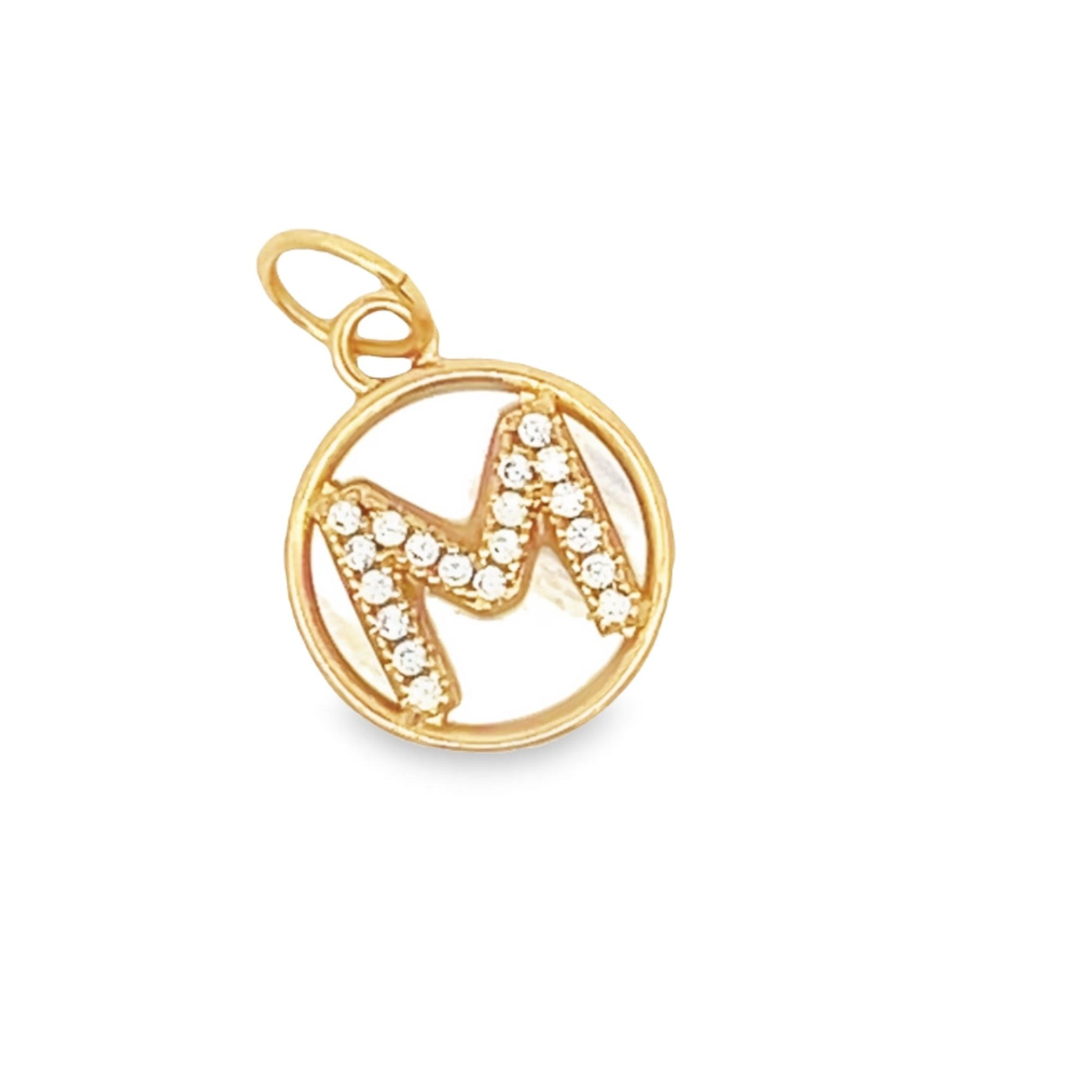 A sparkling gold initial M pendant features embedded diamonds inside a delicate circular frame.