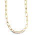 A thick gold paperclip chain necklace rests against a clean white background.