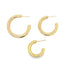 Three thick gold hoop earrings in descending sizes sit arranged on a white background.