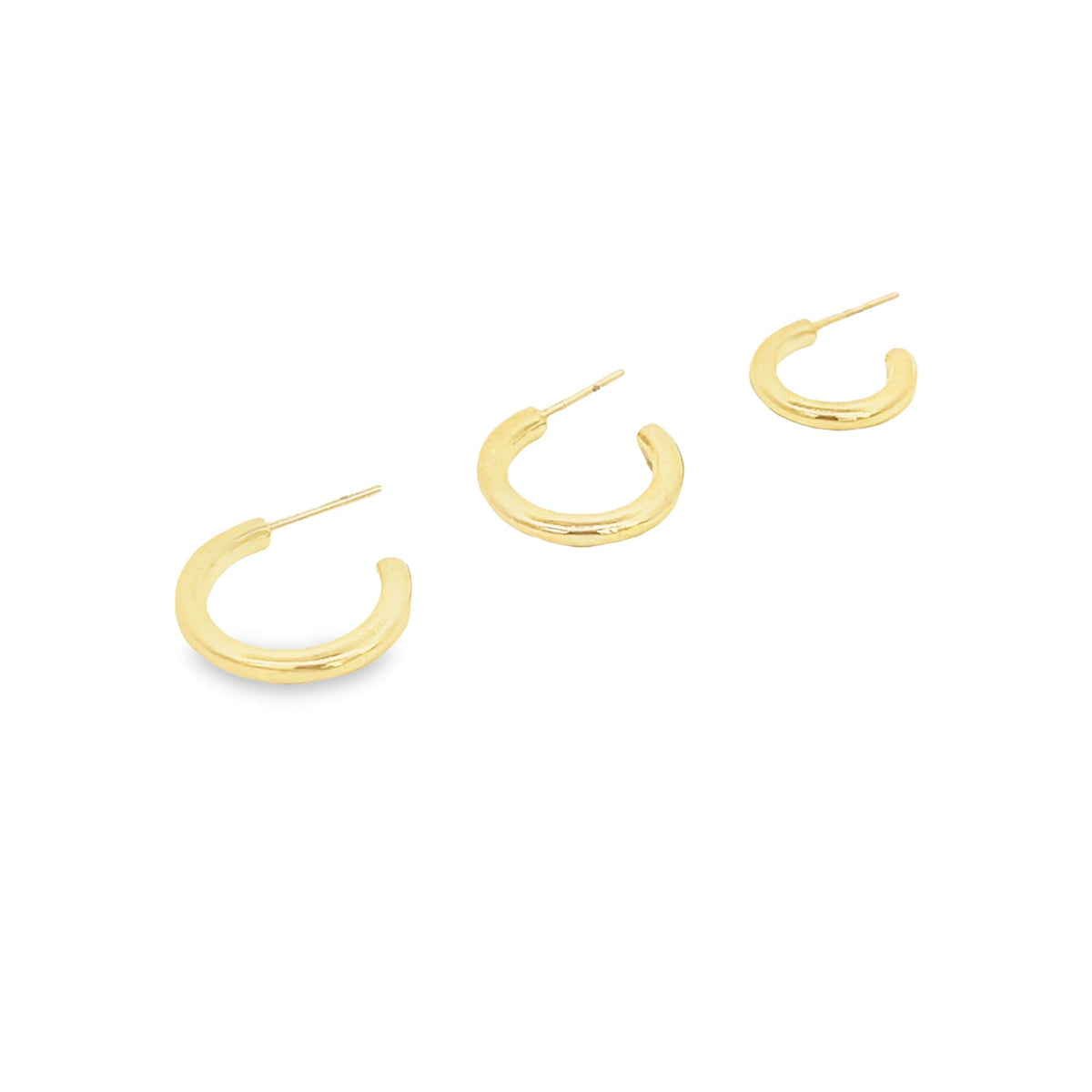 Three small, chunky gold hoop earrings with post backs are displayed diagonally on a plain white background.