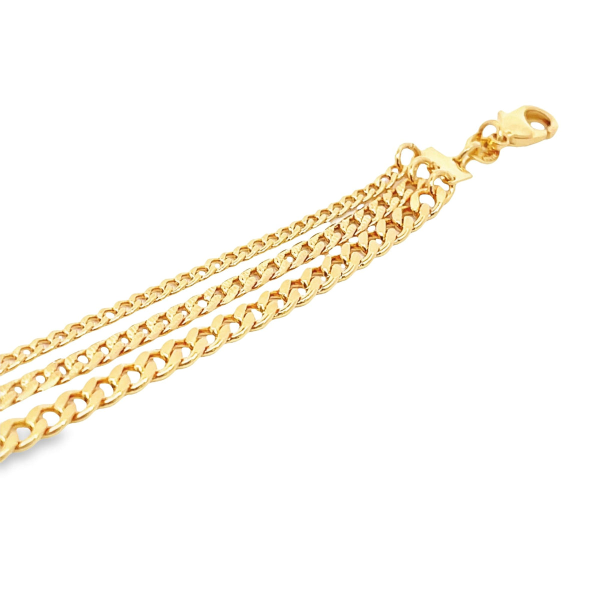 A multi-strand gold curb chain bracelet features interlocking links and a secure lobster clasp against a clean white background.