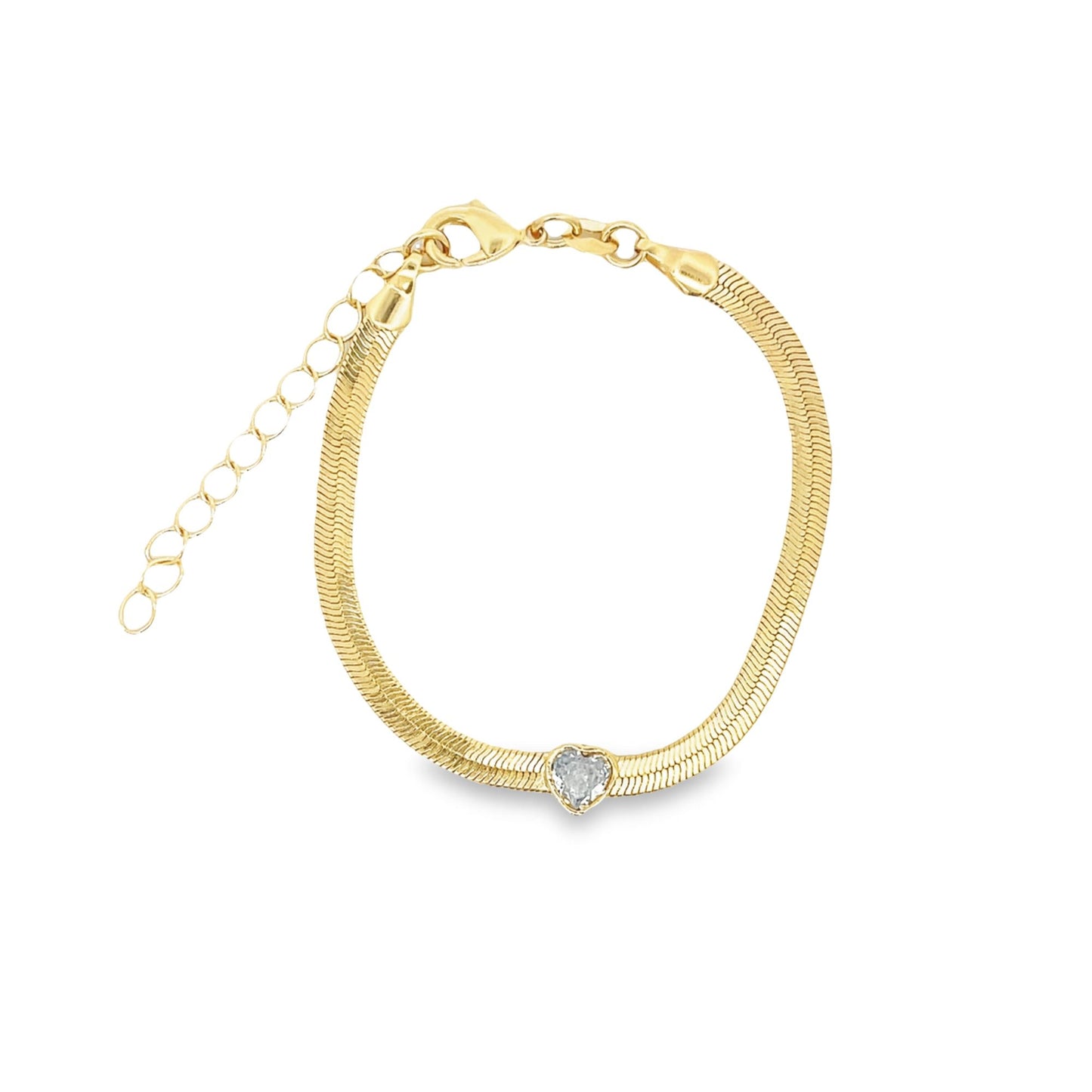 A gold herringbone chain bracelet features a sparkling crystal heart charm and an adjustable extension chain.