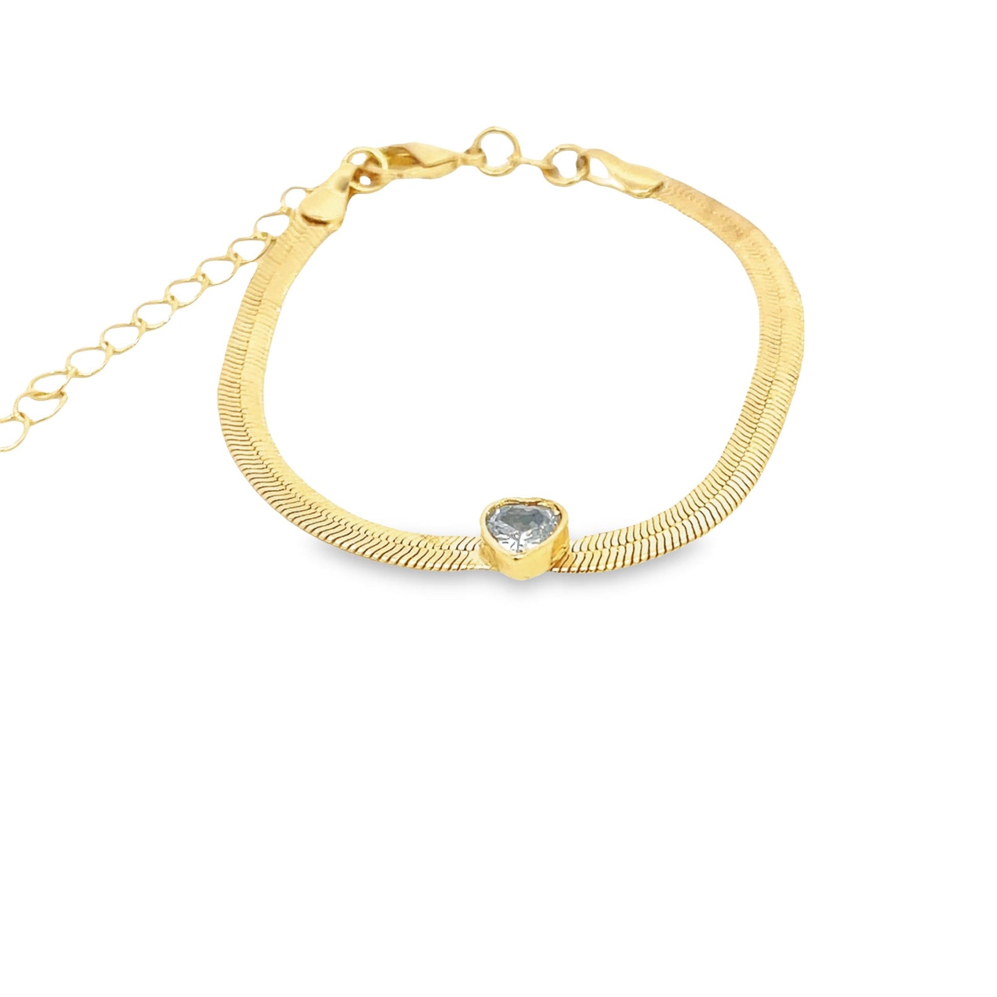 A gold herringbone chain bracelet features a sparkling heart-shaped cubic zirconia pendant and an adjustable extension chain.