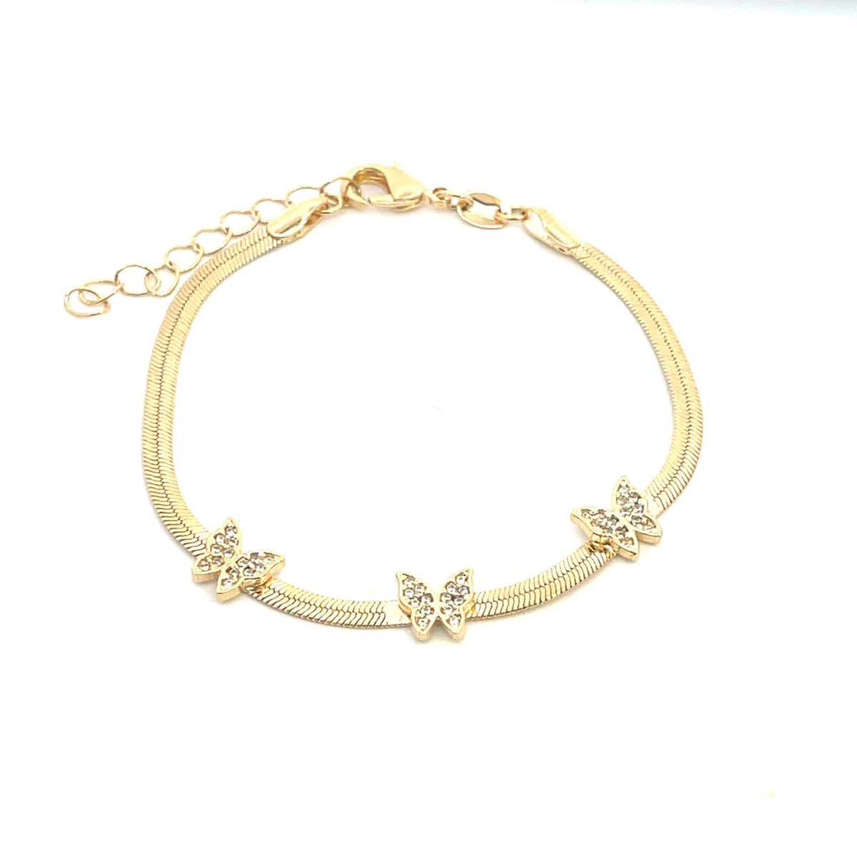 A gold herringbone chain bracelet features three sparkling crystal-embellished butterfly charms and an adjustable extension clasp against a clean white background.