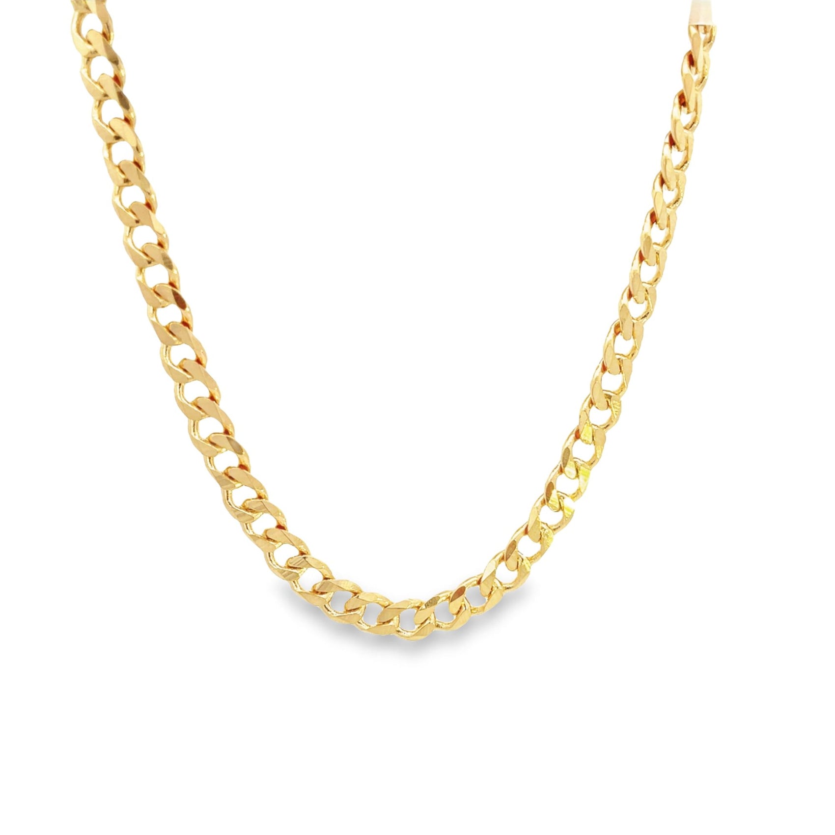 A shiny gold curb chain necklace hangs against a plain white background.