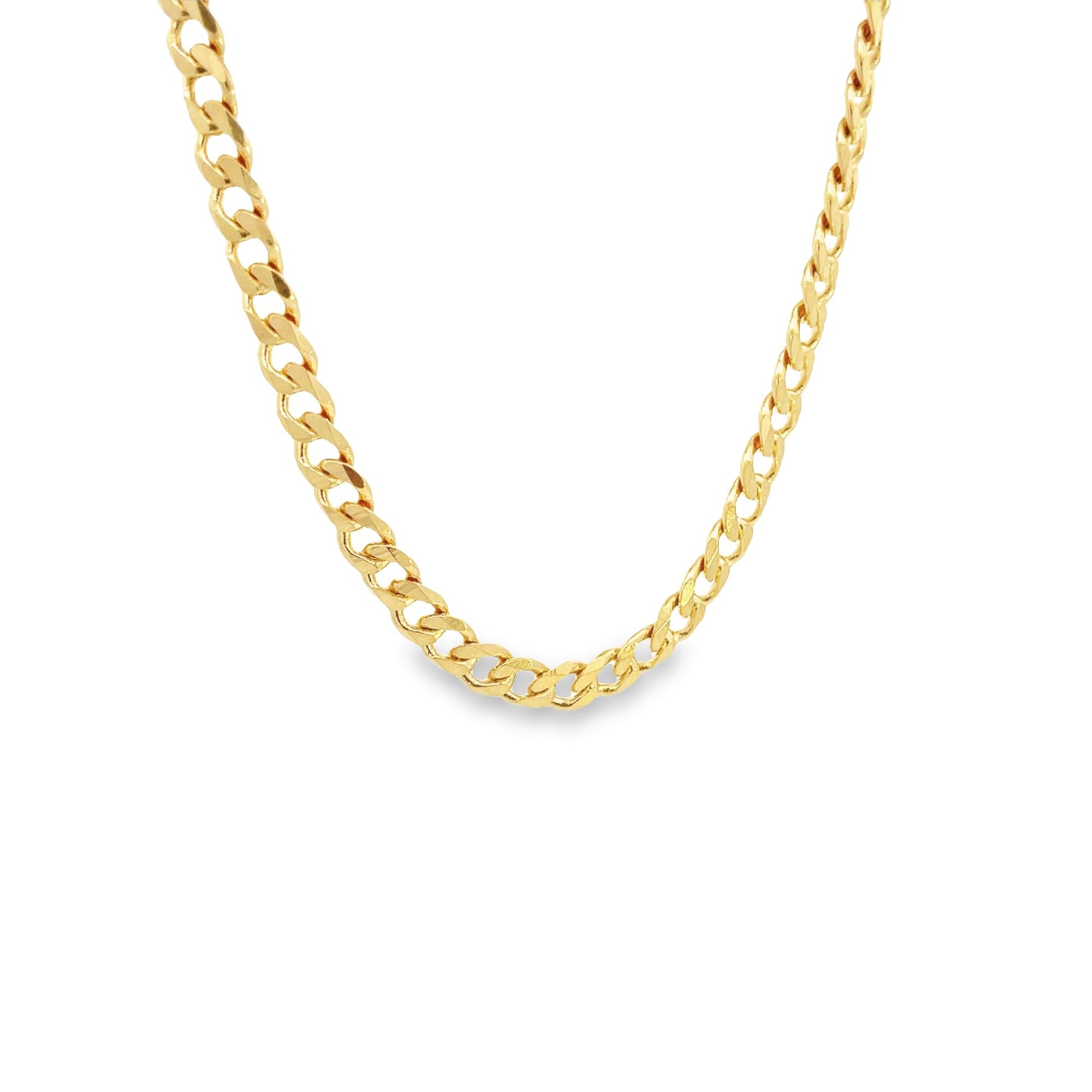 A gleaming gold Cuban link chain hangs against a clean white background.