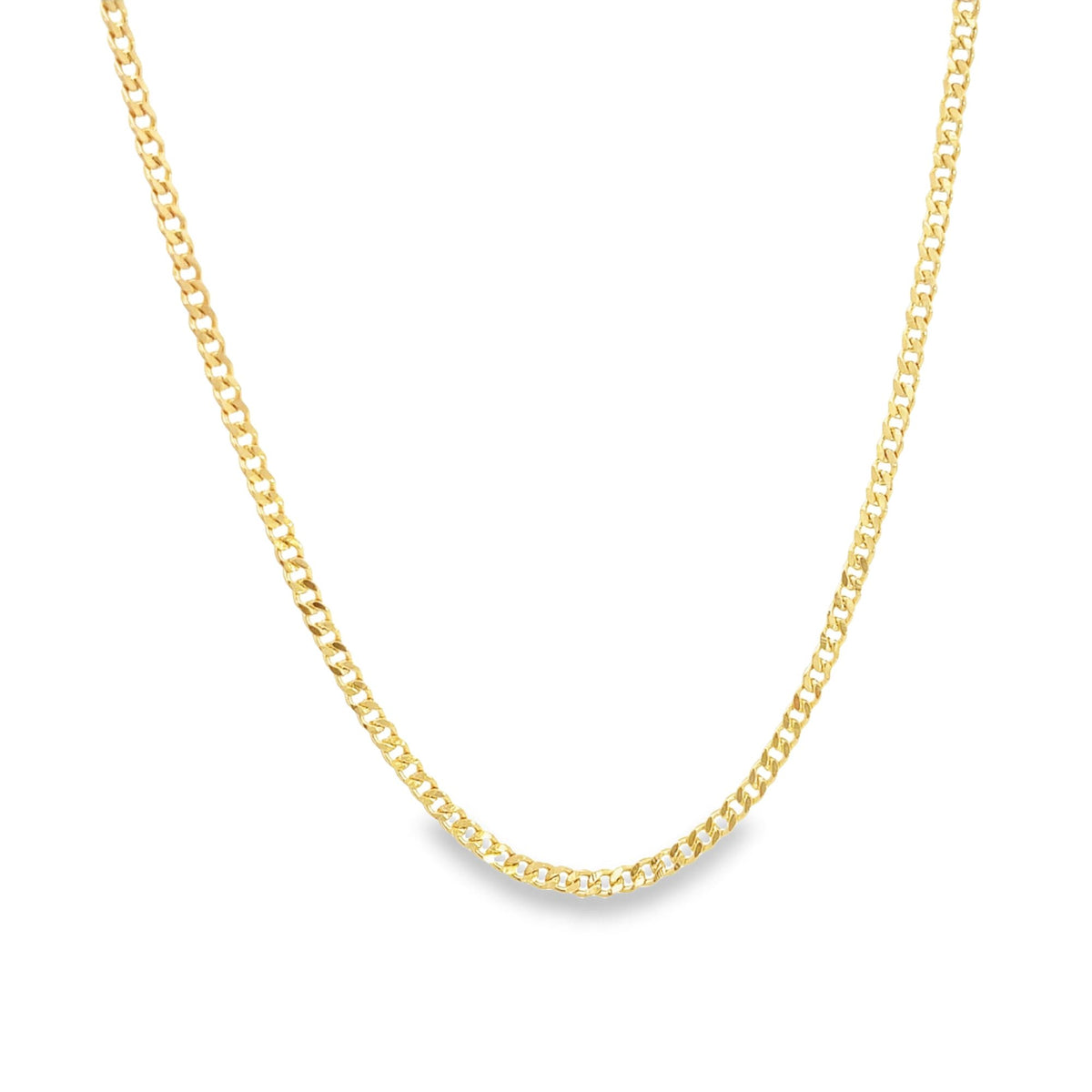 A classic gold cuban link chain necklace drapes elegantly against a clean white background.