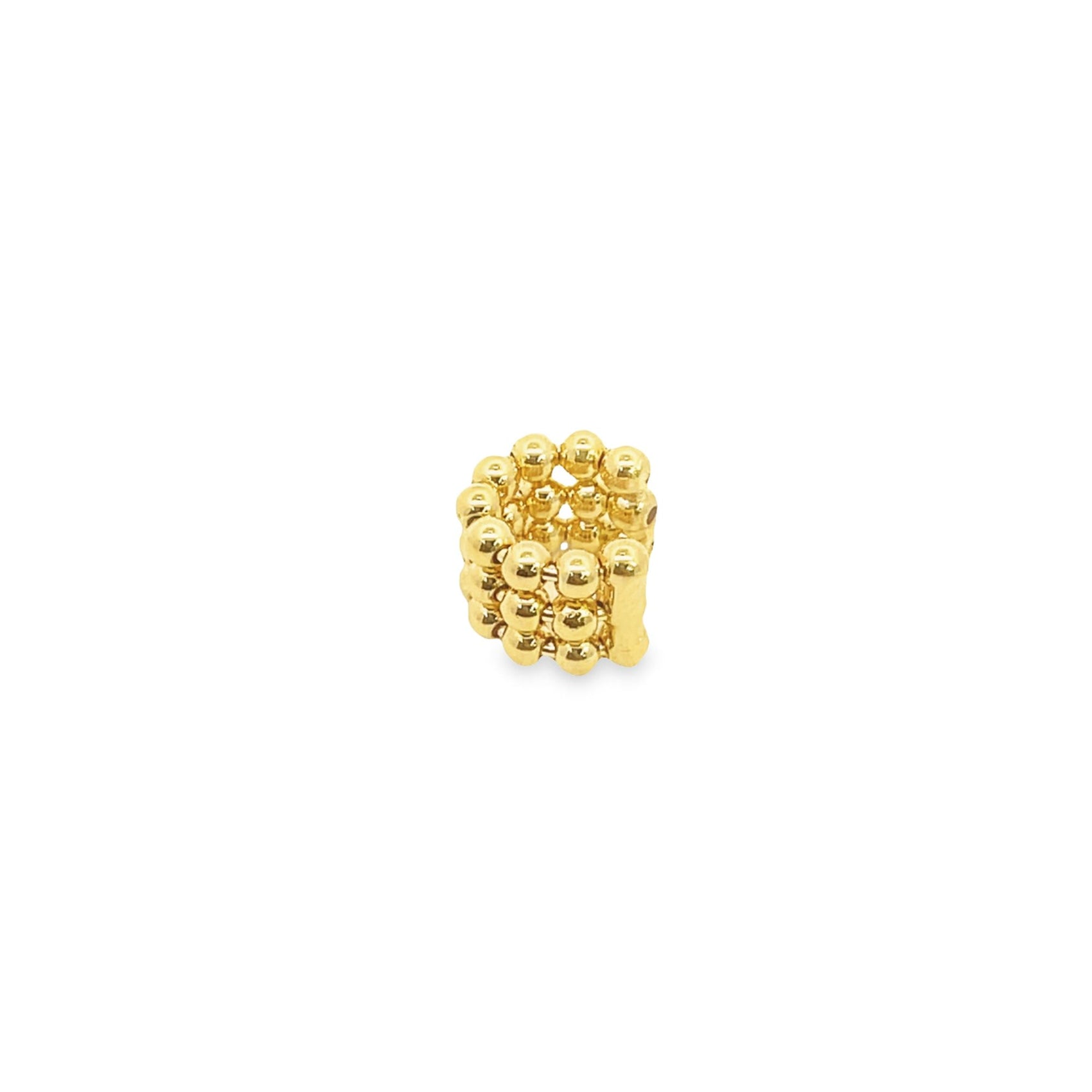 A thick gold ear cuff features a textured, multi-layered design made of tiny, shiny beads.